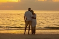 Senior couple enjoying the rooftop pool at Riviera Vacation Home in Playa del Carmen.