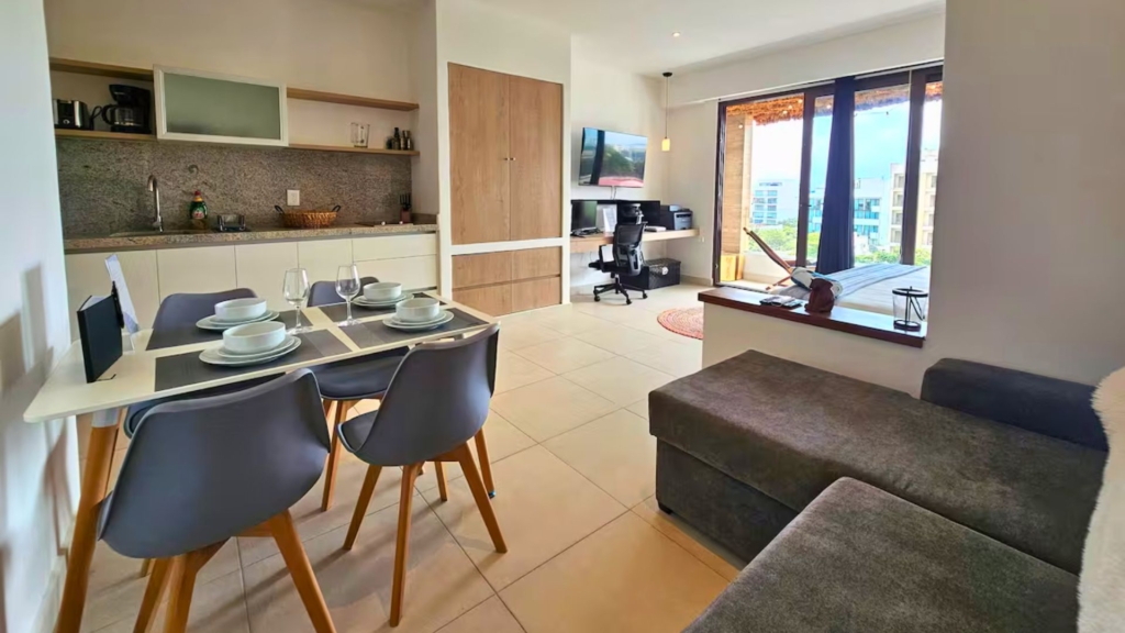 Blanko 504: Modern ocean-view studio for seniors managed by Riviera Vacation Home.