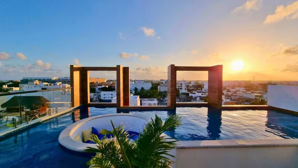 Sunset at the rooftop pool of Riviera Vacation Home studio